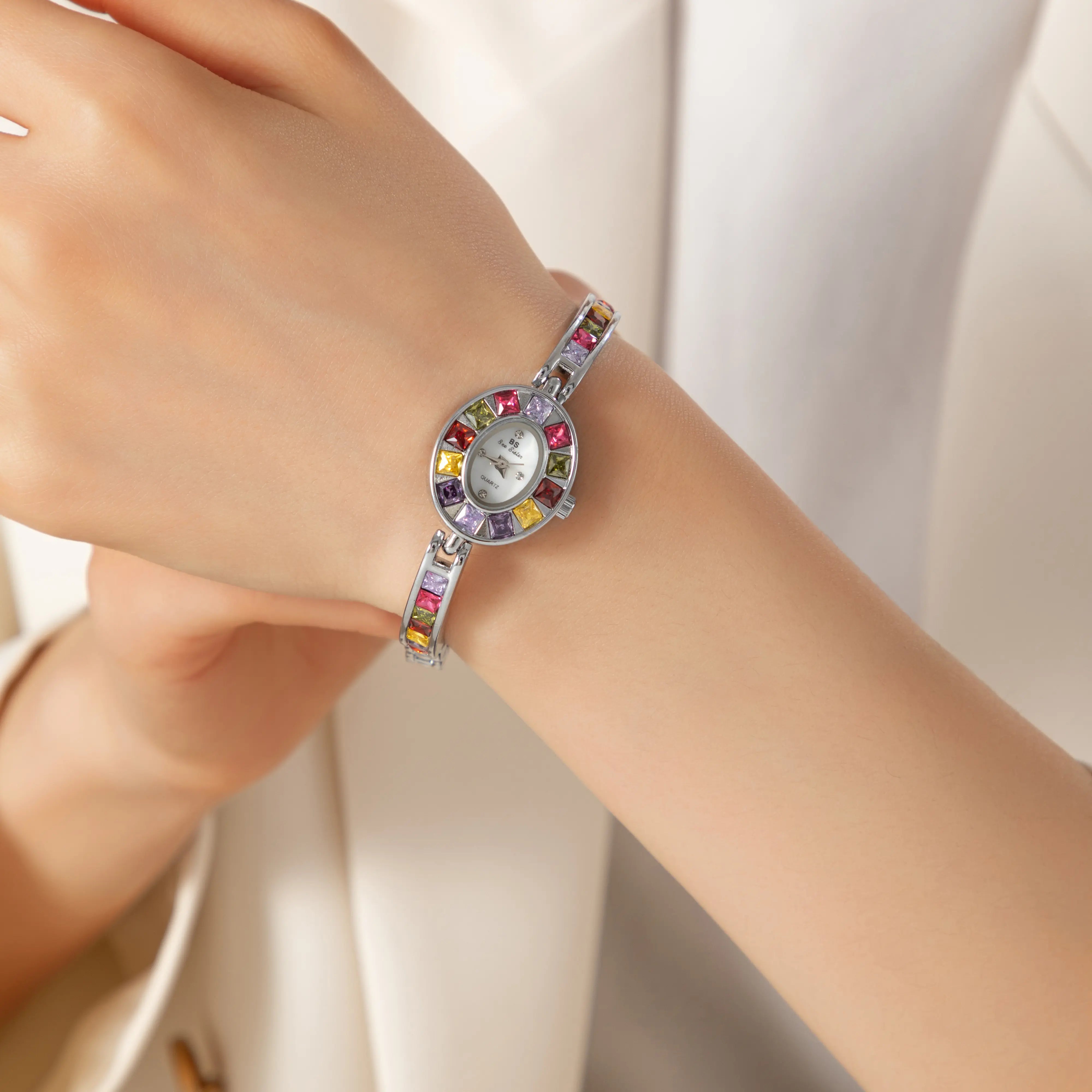 Amélie – Orologio dorato con quadrante in vetro.