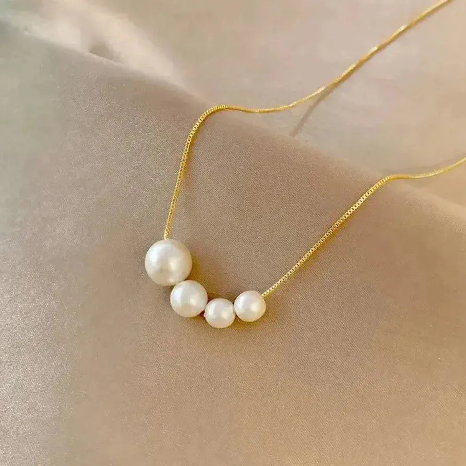 Collana d'oro con dolci perle