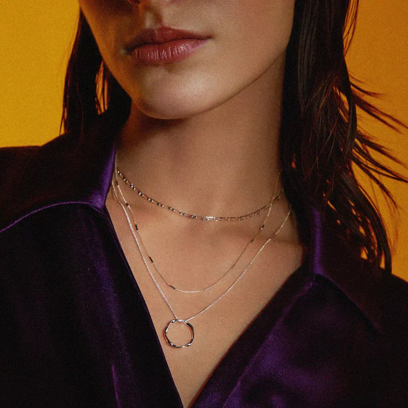 Collana aperta a tre file