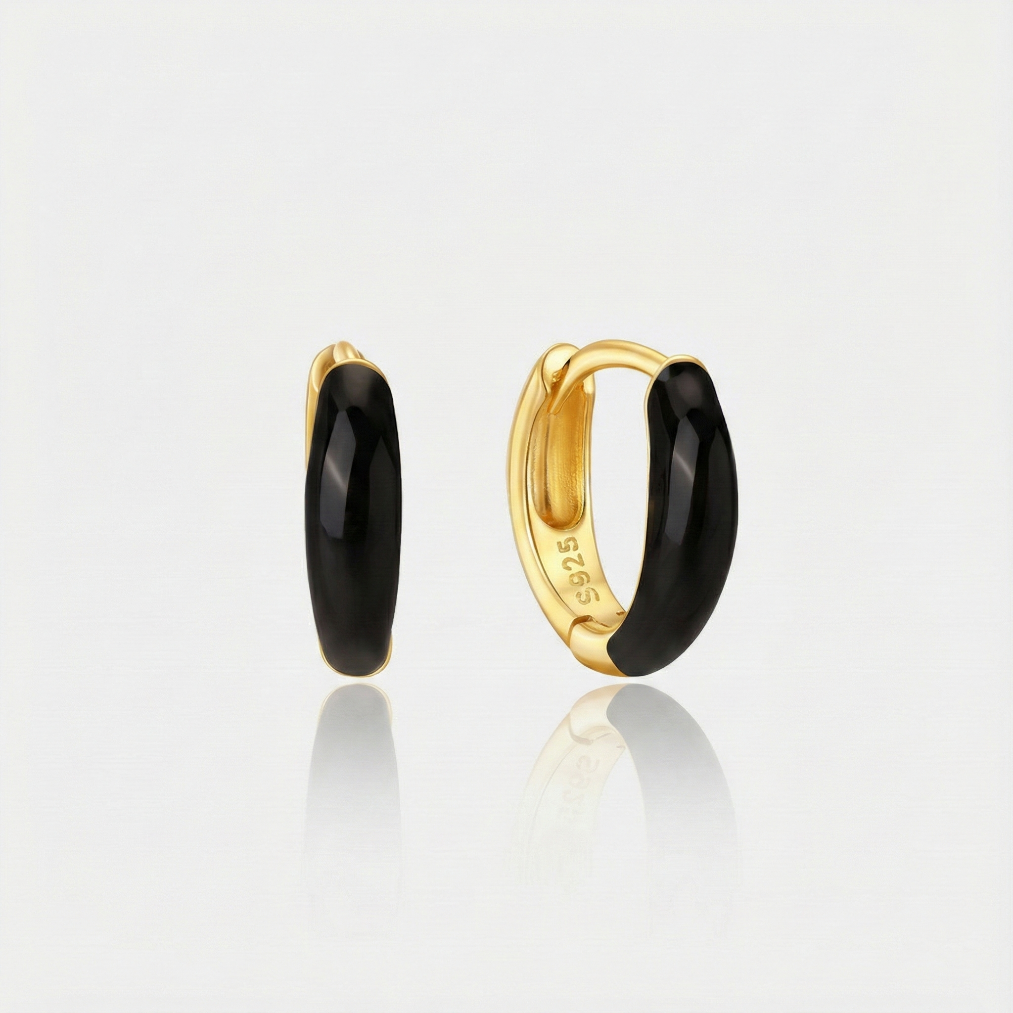 Theresia – Orecchini dorati con curva morbida