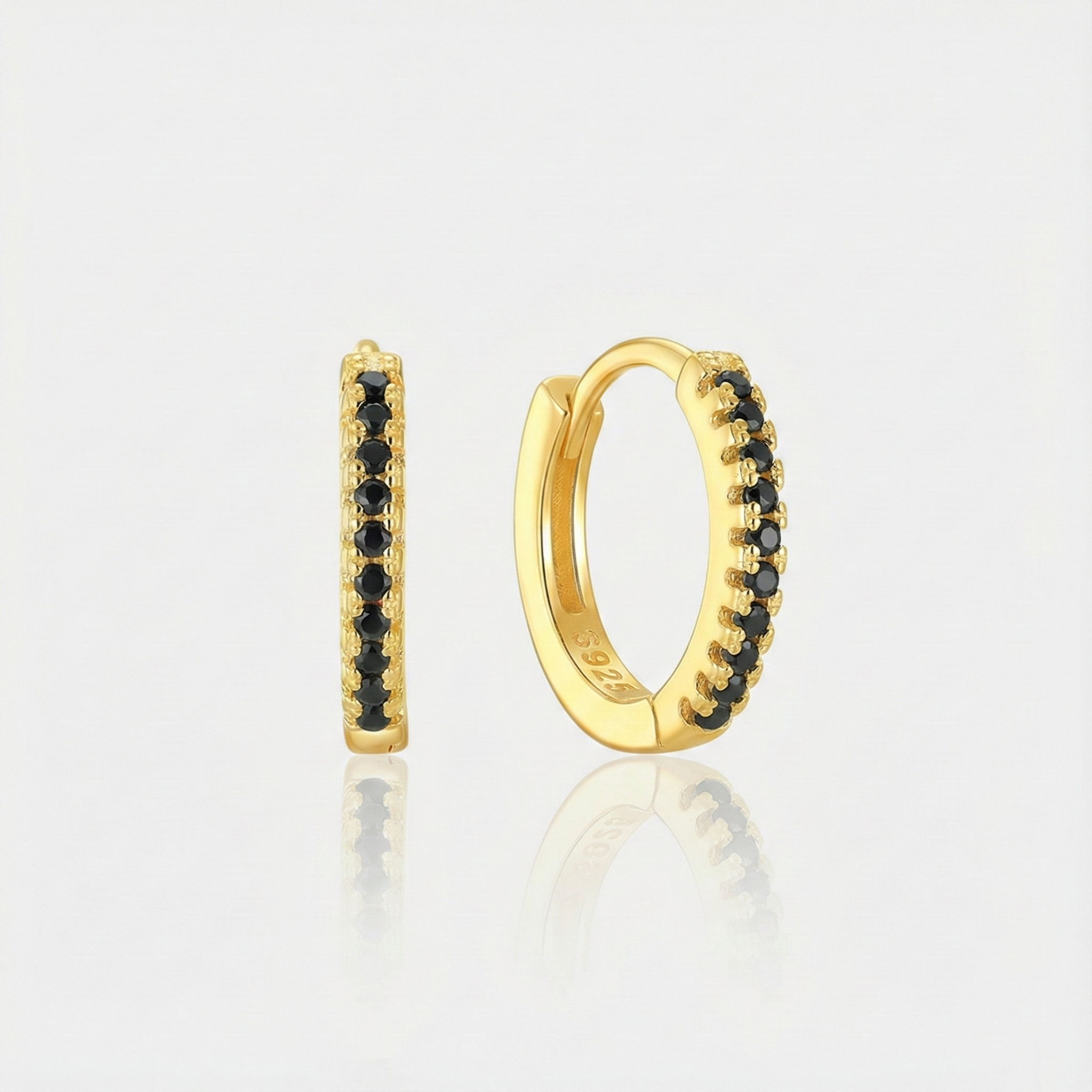 Theresia – Orecchini dorati con curva morbida