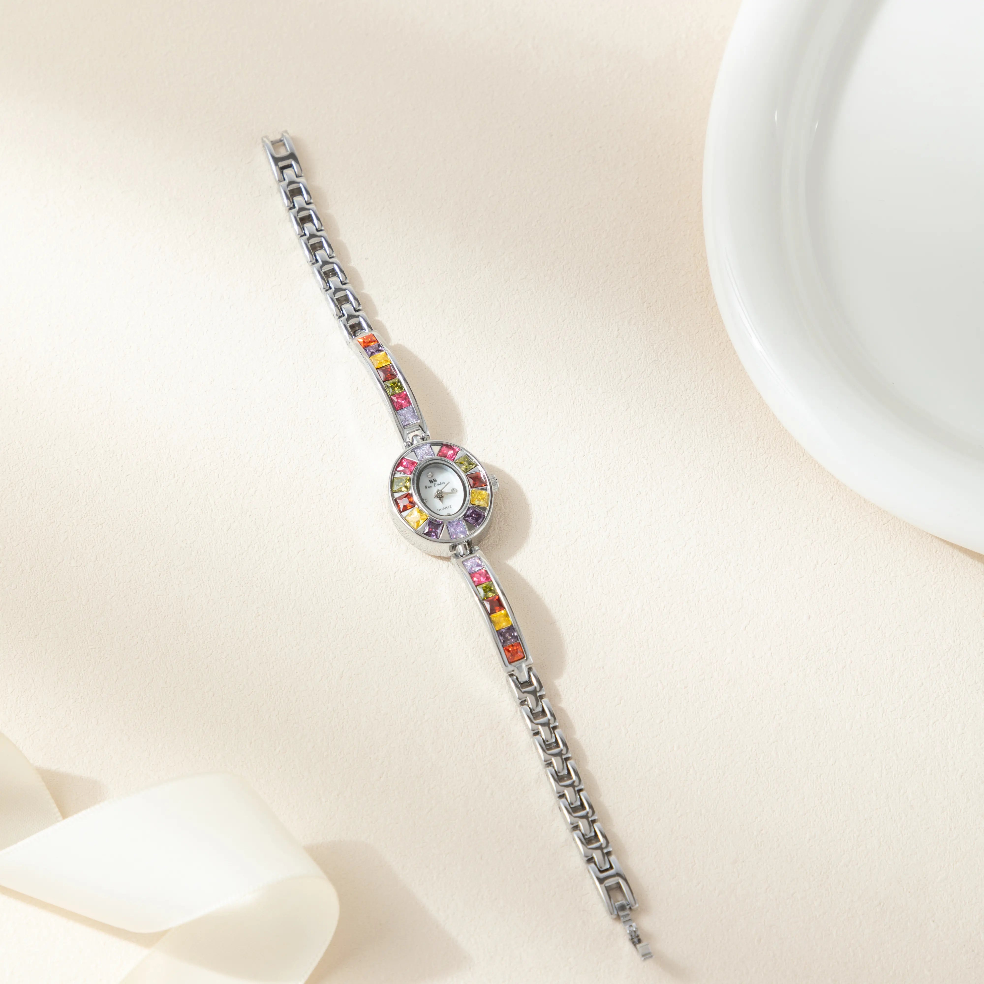 Amélie – Orologio dorato con quadrante in vetro.