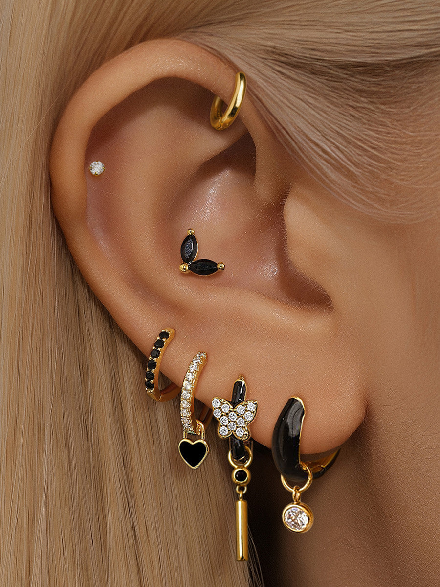 Theresia – Orecchini dorati con curva morbida