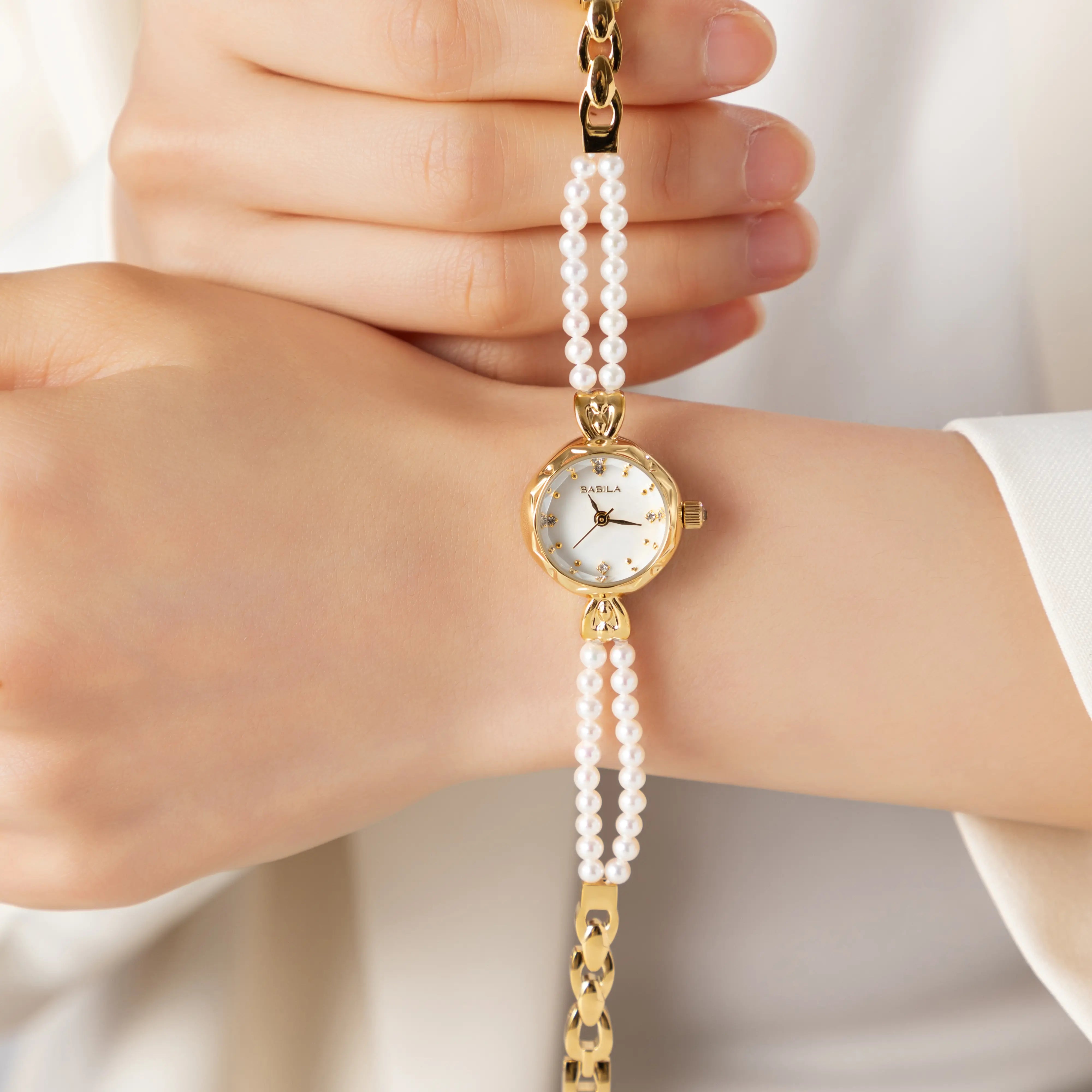 Johanna – Orologio d'oro con cinturino in cristallo.