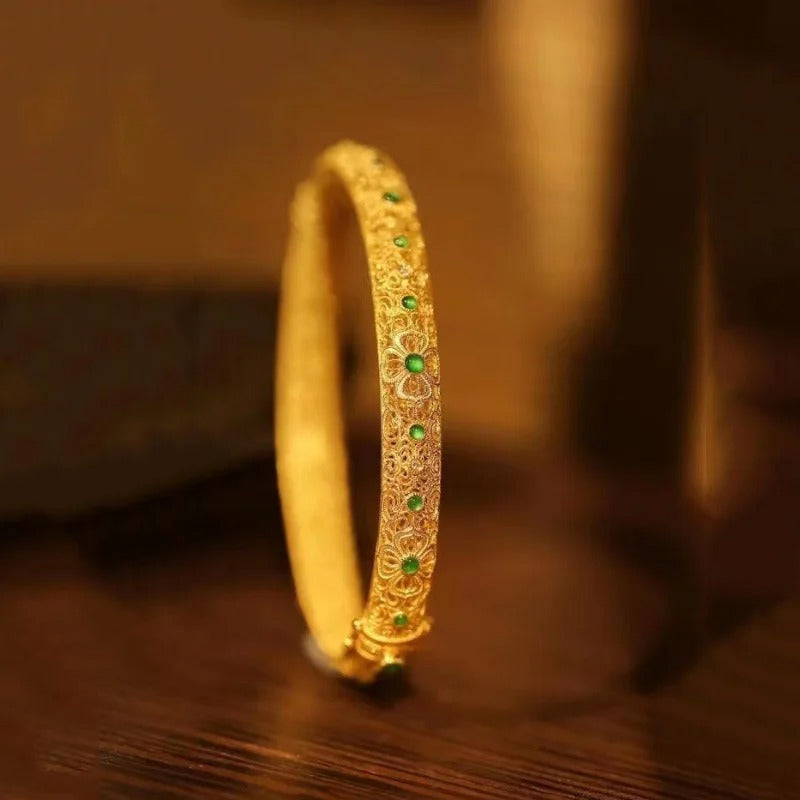 Bracciale tipo braccialetto con pietre preziose verdi dorate