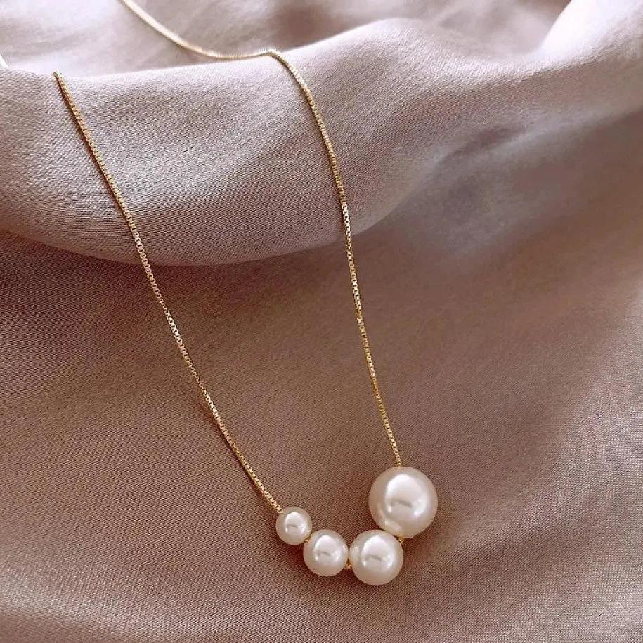 Collana di perle dorate