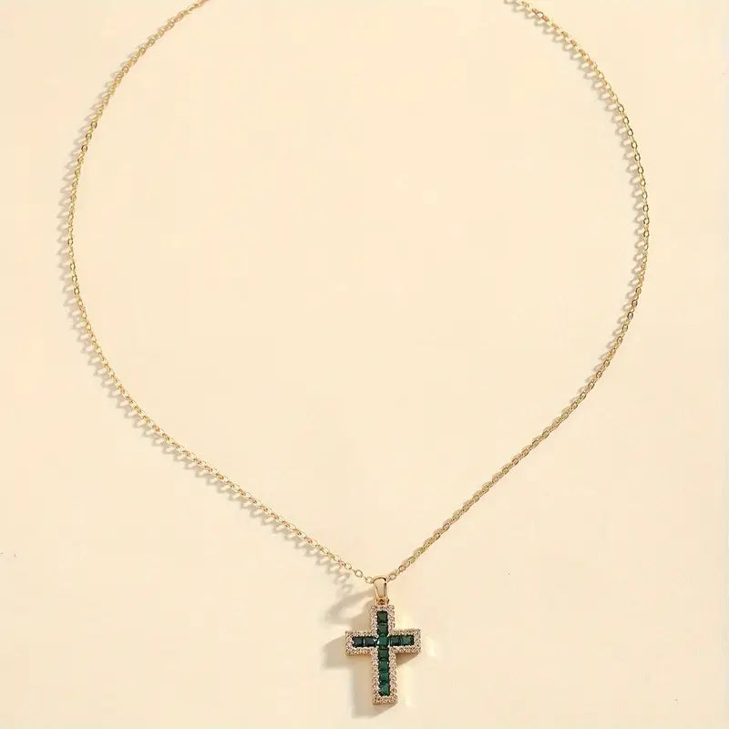 Collana d'oro con croce in smeraldo
