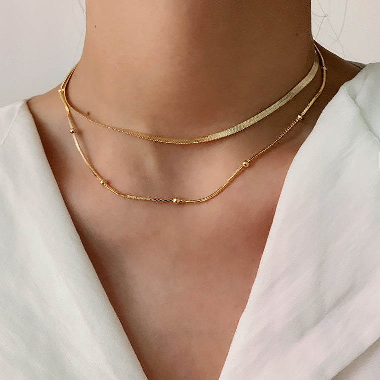 Klára – Collana doppia in oro con un tocco moderno.