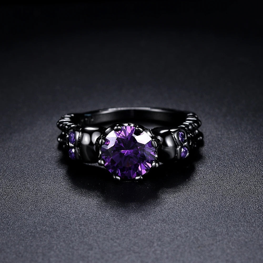 Anello rotondo retro nero con prezioso gemma viola e design intricati