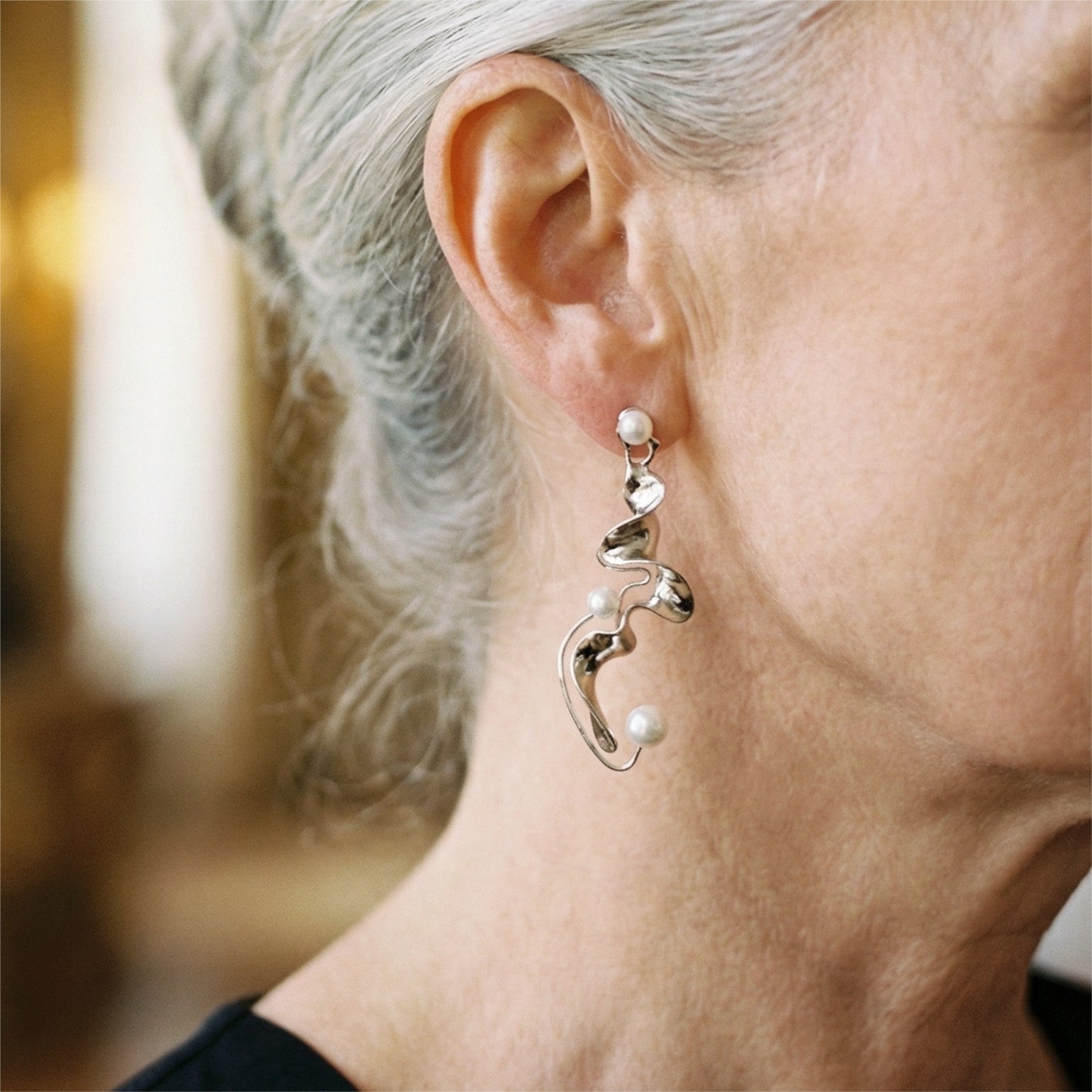 Orecchini astratti vintage in argento con perle