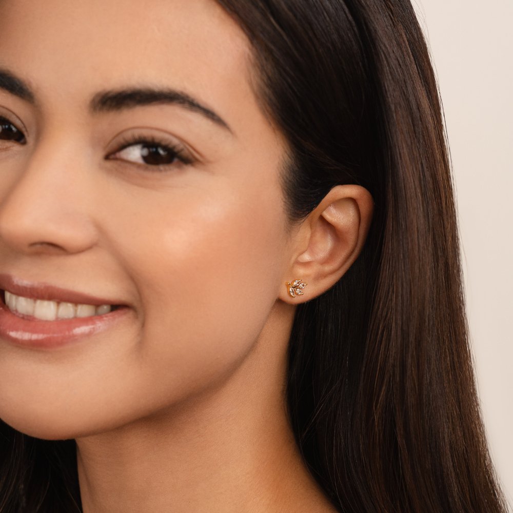 Felìsita – Orecchini d'oro con dettagli a foglia.