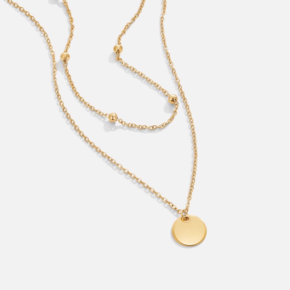 Analena – Collana doppia in oro con pendente.