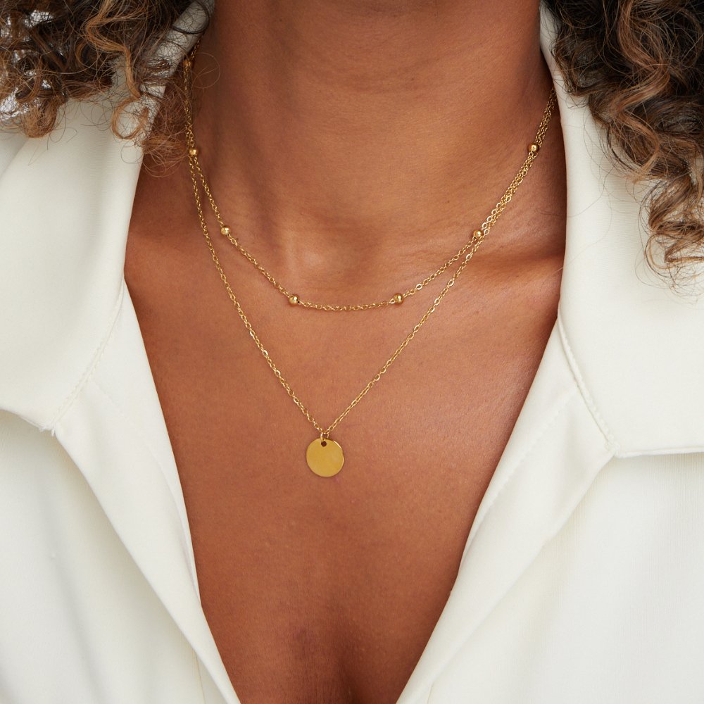 Analena – Collana doppia in oro con pendente.